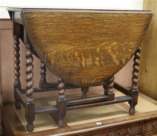 A 1920s oak barley twist gateleg table W.91cm